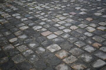stone paving wet after rain Wet Paving Stones after the Rain with Light of Sun 