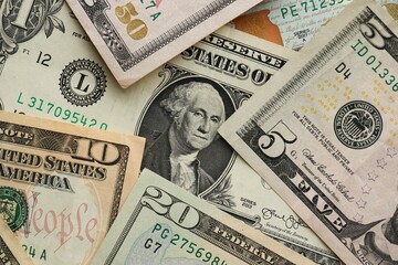 Stack of dollar bills. Hundred, fifty, twenty, ten, five dollars banknote close up