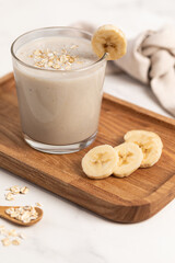 Banana Smoothie with Oats, Healthy Food, Vegan or Vegetarian Diet Food Concept