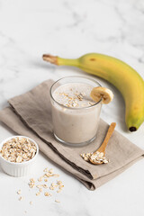 Banana Smoothie with Oats, Healthy Food, Vegan or Vegetarian Diet Food Concept