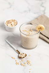 Banana Smoothie with Oats, Healthy Food, Vegan or Vegetarian Diet Food Concept