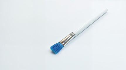 Fototapeta premium Blue Makeup Brush on White Background — Minimalist Style.