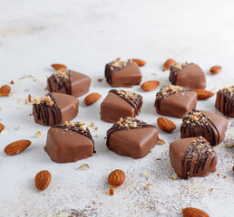 Handmade chocolate with pistachios, dark and milk chocolate pieces.