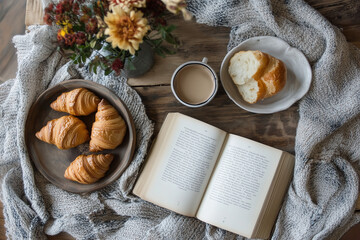 Cozy Autumn Morning with Croissants, Coffee, and an Open Book