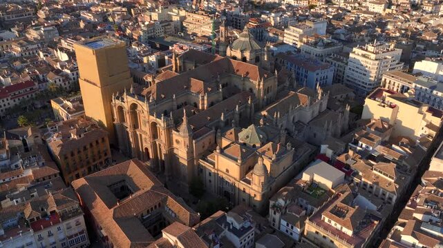 Granada Cathedral, Aerial drone footage of Granada old town in Andalusia, Spain. Aerial Shot on Sunset Light