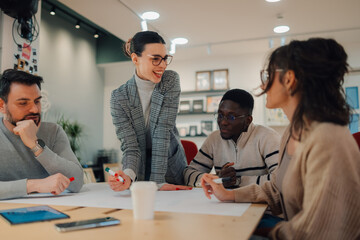 Marketing team planning new campaign during brainstorming meeting