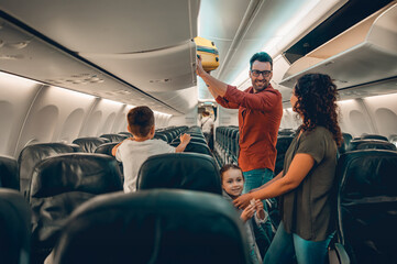 A joyful family enjoys their delightful journey in an airplane, showcasing travel and bonding...