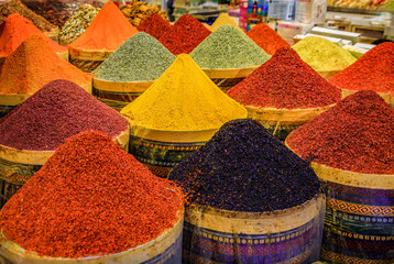 Orange paprika and colorful spices at a vibrant bazaar market, Istanbul, Turkey