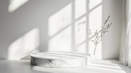 Fototapeta premium Soft, abstract shadow drops from a round marble table top on a white wall, creating an artistic and clean space for showcasing luxury product mockups.