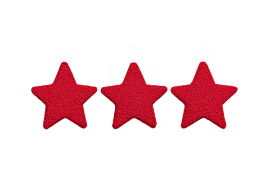 A Three red textured stars are aligned against plain background, creating simple and bold visual. stars have rough surface, adding depth and interest to composition
