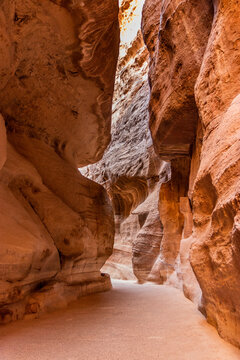 The Siq gorge, main entrance to the ancient city Petra, Jordan