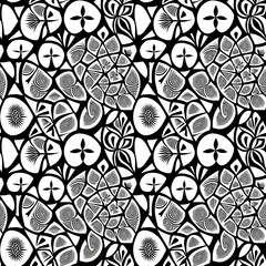 A black and white abstract pattern of flowers and leaves.