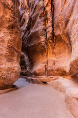 The Siq gorge, main entrance to the ancient city Petra, Jordan
