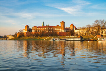 Fototapeta premium Wawel castle famous landmark in Krakow Poland. Picturesque landscape on coast river Wisla