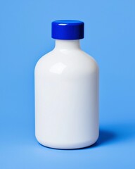Naklejka premium White Bottle with Blue Cap on Light Blue Background