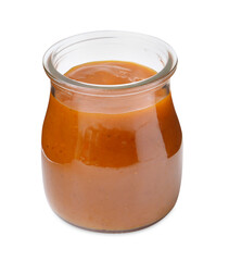 Tasty curry sauce in glass jar isolated on white
