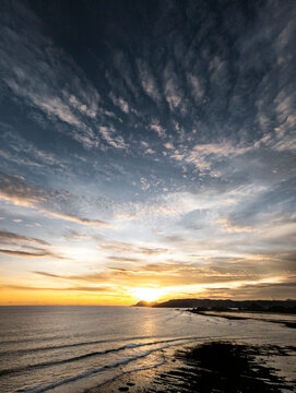 Vivid coastal sunset with open skies, Lombok, Indonesia