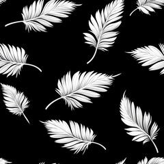 Obraz premium Elegant seamless pattern featuring white leaves on black background creating striking visual effect