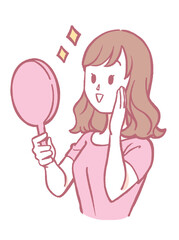 手鏡を見て微笑む女性