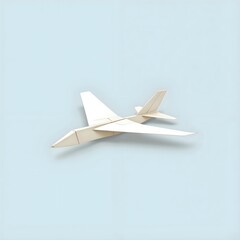 Elegant origami aircraft on soft blue background  a serene expression of flight and creativity, photography of still life concept.