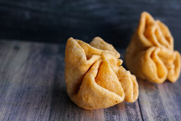 hibiscus flower(kembang waru) snack is a typical bread from Gede city, Yogyakarta area. Made from wheat flour, chicken eggs, sugar, milk, vanilla, and butter.