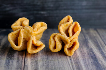 hibiscus flower(kembang waru) snack is a typical bread from Gede city, Yogyakarta area. Made from wheat flour, chicken eggs, sugar, milk, vanilla, and butter.