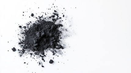 Obraz premium Dark powder scattered on a white background