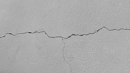 White wall cement broken texture with cracks Background.