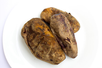 Sweet potato that has been steamed. Sweet potatoes are a good source of fiber, vitamins (A, C, and B6), and carbohydrates.