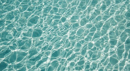 Obraz premium Abstract teal water surface with sunlight reflections background