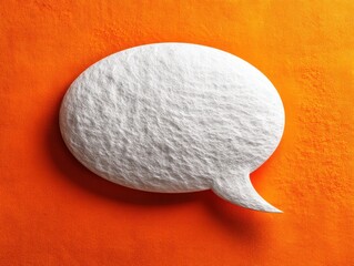White Speech Bubble on Vibrant Orange Background for Creative Use