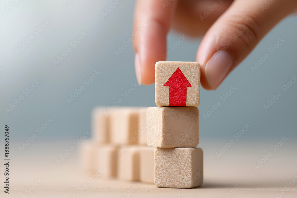 Aufkleber a hand places a wooden block with a red upward arrow on top of a stack, symbolizing growth or progre