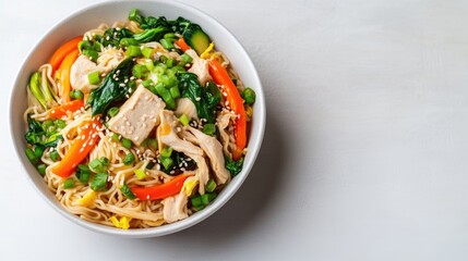A bowl of chicken and vegetable noodles is presented. The noodles are light brown, topped with sliced chicken, orange bell peppers, green onions, and spinach. A white bowl holds the dish against a