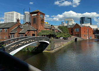 View of a canal bridge next to a pub within the Canals of Birmingham, United Kingdom