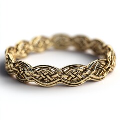 Obraz premium Elegant gold braided ring showcasing intricate craftsmanship.