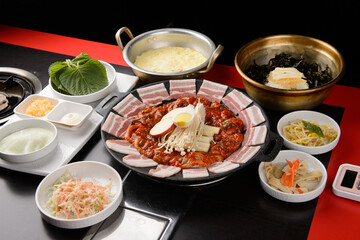 Stir-fried octopus and pork belly and Korean side dishes
