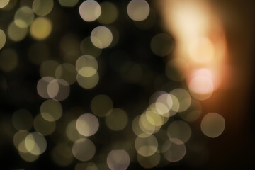 Abstract Bokeh Lights Background: Soft Focus Circular Blur in Black and Gold