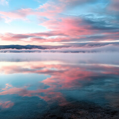 Serene lake at sunrise