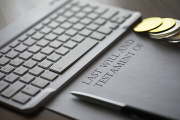 Last Will and Testament with Keyboard and Coins - Estate Planning and Financial Documentation