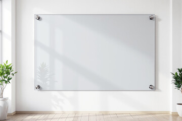 Blank glass whiteboard mockup on a white wall in a modern office with natural light.