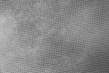 Black background with dots. Logo design. Black background with dots. Logo design. A white light is on the photo. Ideal for background setting of photos.