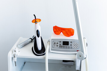 close up of medical protective red glasses and laser