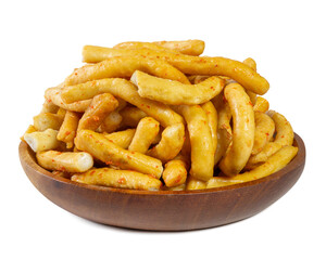 Golden-yellow crispy rice sticks in a wooden bowl, isolated on white background