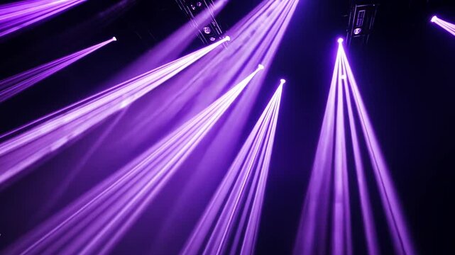Captivating purple stage illumination with dynamic beams for concerts or events