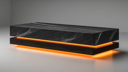 Sleek modern coffee table with black marble top and illuminated orange base in minimalist setting