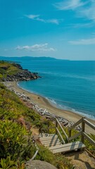 A stunning sea view with a sandy shore, showcasing a vibrant landscape with vivid colors. Tranquil waves meet golden sands under a breathtaking sky, perfect for travel and nature themes. 