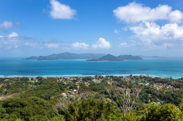 Island Praslin seen from Island La Digue, Republic of Seychelles, Africa.
