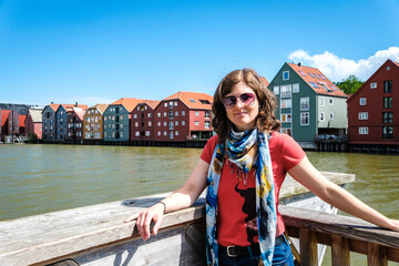 Female tourist at Bakklandet district in Trondheim