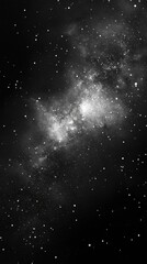 Obraz premium Ethereal monochrome depiction of a vast starfield with countless stars and nebulous clouds in deep space