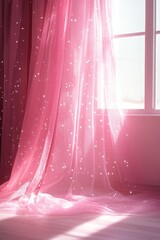 Pink sheer curtains illuminated by sunlight in a bright room